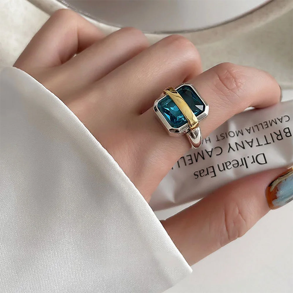 VILZSTUDIOS Stylish ring featuring a blue gemstone with silver and gold accents