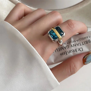 VILZSTUDIOS Stylish ring featuring a blue gemstone with silver and gold accents