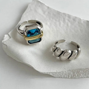 VILZSTUDIOS Stylish ring featuring a blue gemstone with silver and gold accents
