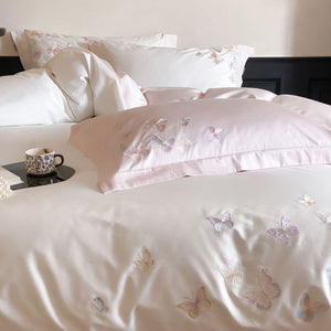 VILZSTUDIOS ivory and blush pink, blush pink or pale blue satin duvet cover set with pastel butterfly embroidery
