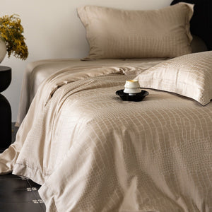 VILZSTUDIOS neutral satin jacquard duvet cover set with wide pillowcase borders and dark contrast piping