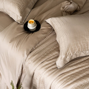 VILZSTUDIOS neutral satin jacquard duvet cover set with wide pillowcase borders and dark contrast piping