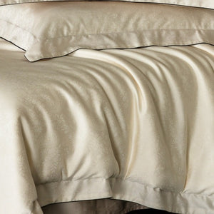VILZSTUDIOS neutral satin jacquard duvet cover set with wide pillowcase borders and dark contrast piping