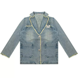 VILZSTUDIOS Ripped denim blazer with butterfly pin and frayed edges