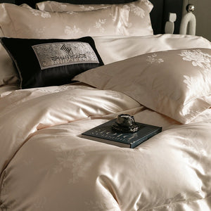 VILZSTUDIOS champagne cream or blush pink satin bedding set with woven roses and wide-flanged pillowcases