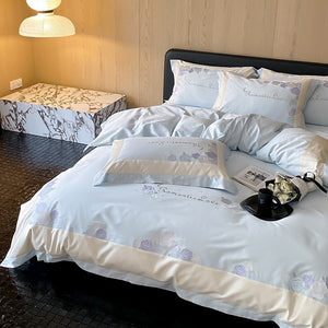 VILZSTUDIOS pastel pink or light blue rose and celestial embroidered bedding set with contrast borders and ruffled edges