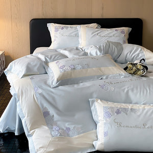 VILZSTUDIOS pastel pink or light blue rose and celestial embroidered bedding set with contrast borders and ruffled edges