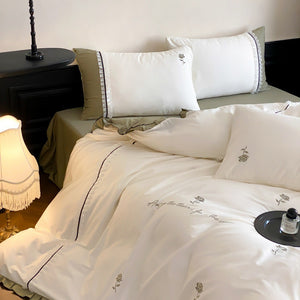 VILZSTUDIOS olive green, pastel pink and ivory white rose-embroidered duvet cover set with white ruffles and contrast piping