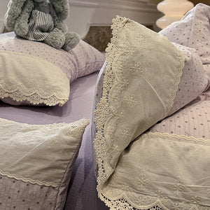 VILZSTUDIOS navy, cream and pastel bedding set with floral or bow-dot patterns and scalloped cream-white lace trim