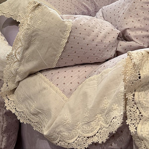 VILZSTUDIOS navy, cream and pastel bedding set with floral or bow-dot patterns and scalloped cream-white lace trim