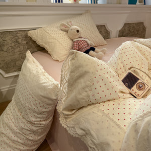 VILZSTUDIOS navy, cream and pastel bedding set with floral or bow-dot patterns and scalloped cream-white lace trim