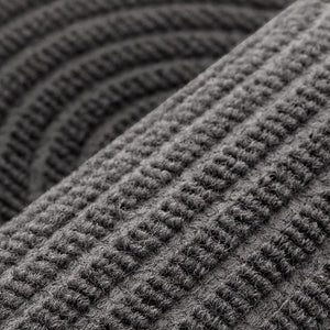VILZSTUDIOS neutral rectangular door mat with sculpted wave patterns and embossed ribbed ridges