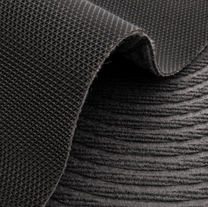 VILZSTUDIOS neutral rectangular door mat with sculpted wave patterns and embossed ribbed ridges