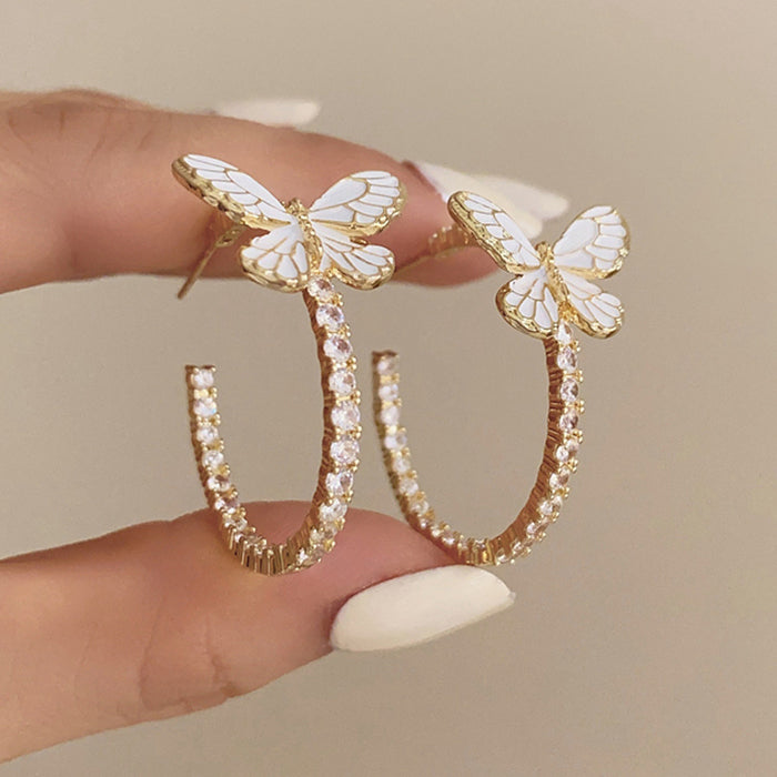 VILZSTUDIOS Sparkling hoop earrings with butterfly design