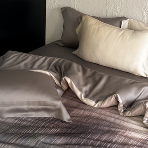 VILZSTUDIOS taupe-grey and ivory ombré satin duvet cover set with subtle ripple patterning and flanged borders