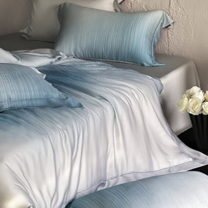 VILZSTUDIOS taupe-grey and ivory ombré satin duvet cover set with subtle ripple patterning and flanged borders