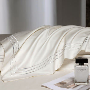 VILZSTUDIOS ivory satin bedding set with triple metallic embroidered stripes and wide flanged borders