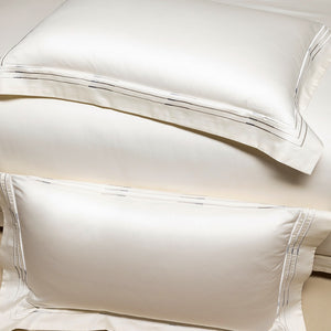 VILZSTUDIOS ivory satin bedding set with triple metallic embroidered stripes and wide flanged borders