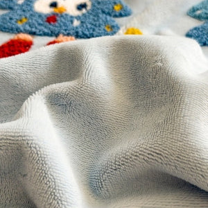 VILZSTUDIOS baby blue and camel fleece bedding set with raised tree and penguin motifs and white pom-pom trim
