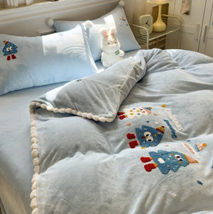 VILZSTUDIOS baby blue and camel fleece bedding set with raised tree and penguin motifs and white pom-pom trim