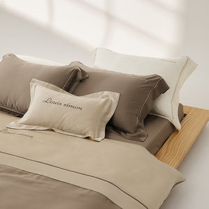 VILZSTUDIOS two-tone satin duvet cover set with script embroidery and contrast piping in taupe, mauve, rust-red or silvery gray