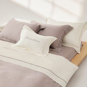 VILZSTUDIOS two-tone satin duvet cover set with script embroidery and contrast piping in taupe, mauve, rust-red or silvery gray