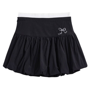 VILZSTUDIOS Y2K inspired balloon mini skirt with high waist and pleated design