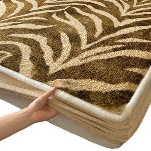VILZSTUDIOS earth-toned zebra-stripe and mottled marble fleece fitted sheet with contrasting plush trim