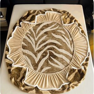 VILZSTUDIOS earth-toned zebra-stripe and mottled marble fleece fitted sheet with contrasting plush trim