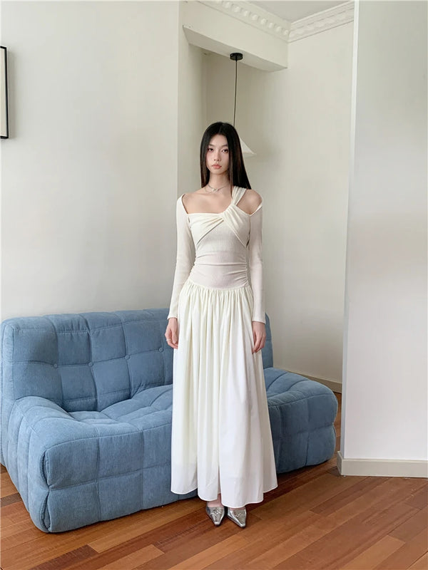 Elegante vestido largo blanco con aberturas