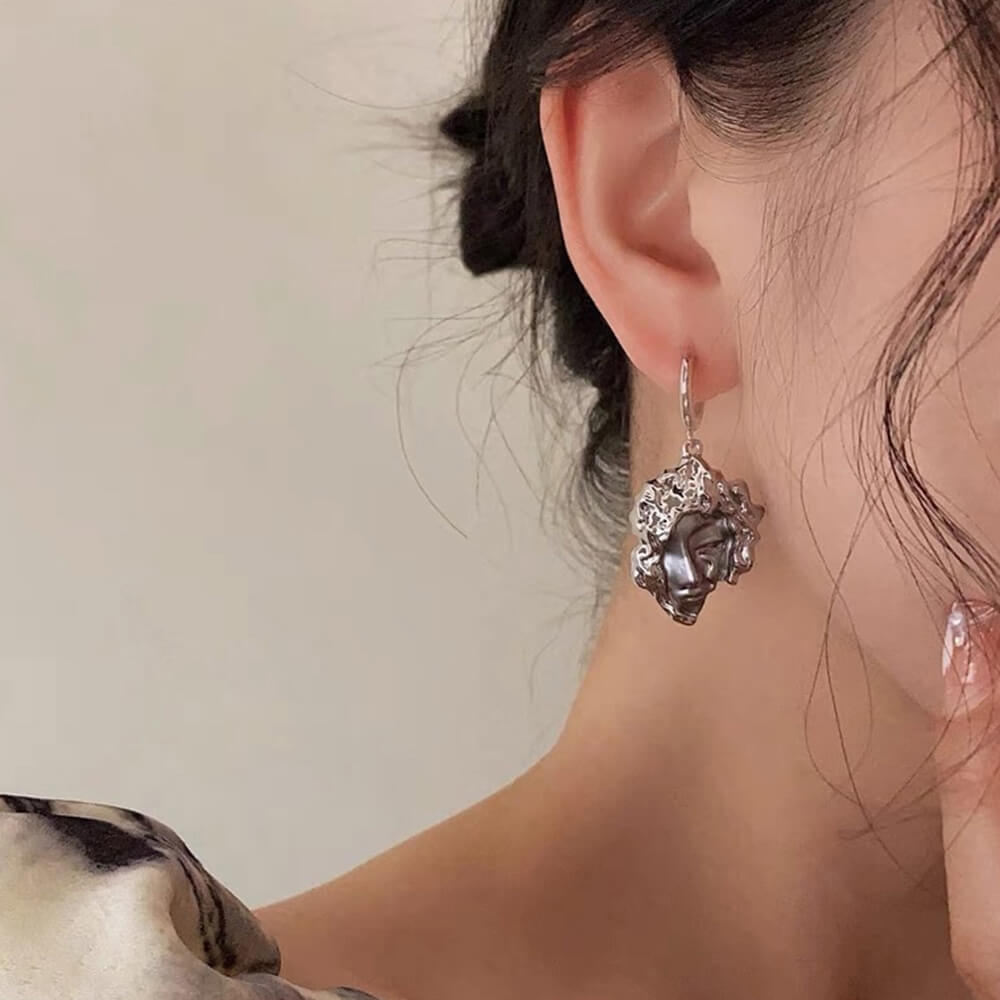 VILZSTUDIOS Artistic face sculpted earrings in silver-tone