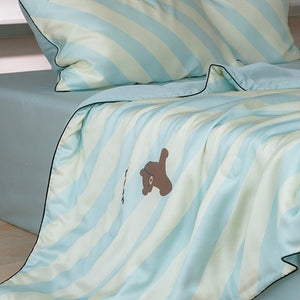 VILZSTUDIOS mint-blue and cream diagonal stripe summer quilt with brown cartoon bears and dark contrast piping