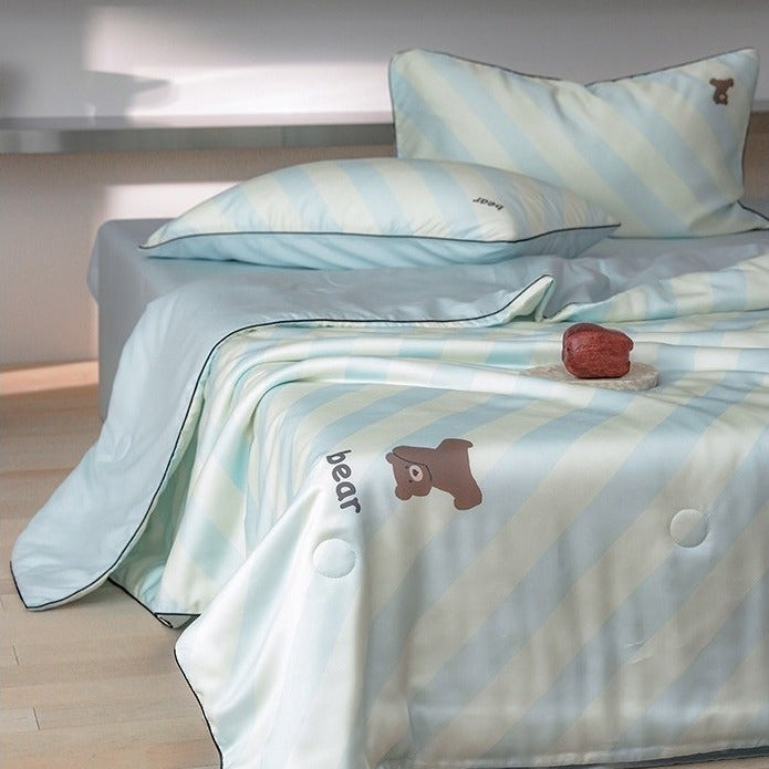 VILZSTUDIOS mint-blue and cream diagonal stripe summer quilt with brown cartoon bears and dark contrast piping