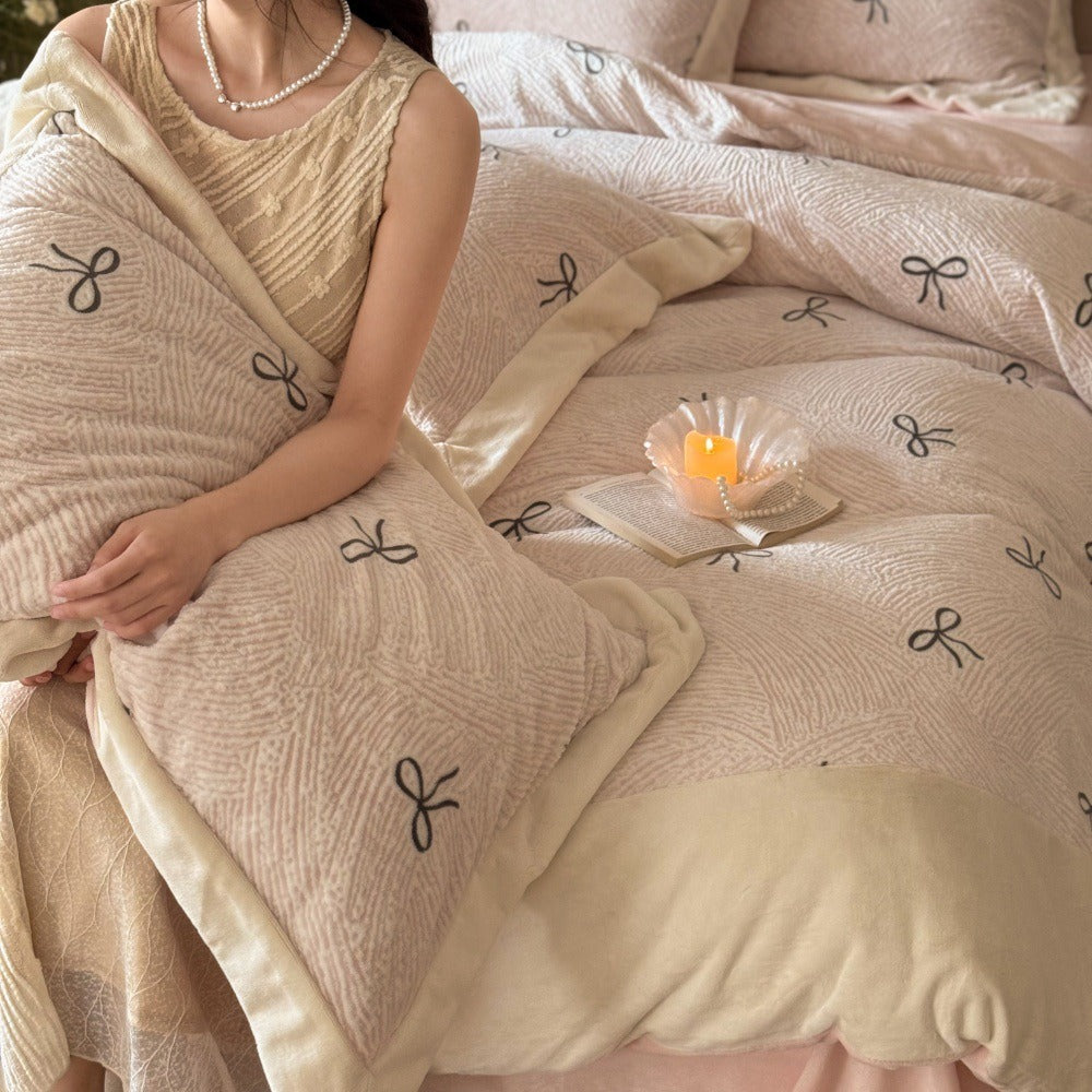 VILZSTUDIOS blush pink fleece bedding set with black embroidered bows and plush cream borders