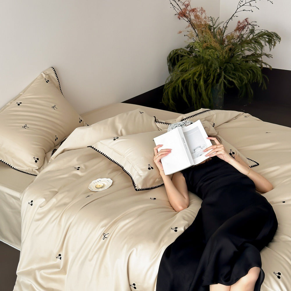 VILZSTUDIOS pastel satin duvet cover set with black cherry and bow embroidery and black zigzag borders