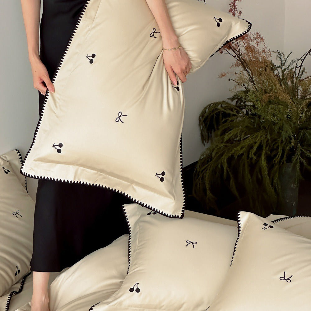 VILZSTUDIOS pastel satin duvet cover set with black cherry and bow embroidery and black zigzag borders