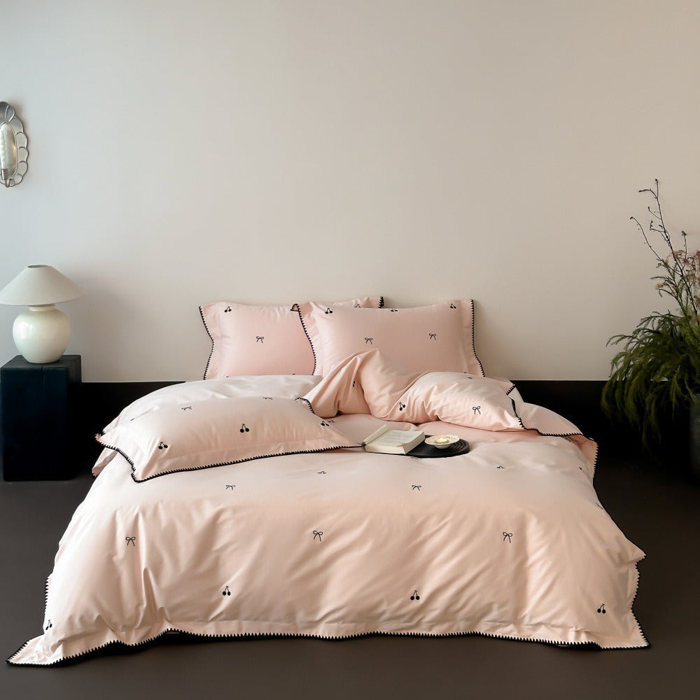 VILZSTUDIOS pastel satin duvet cover set with black cherry and bow embroidery and black zigzag borders