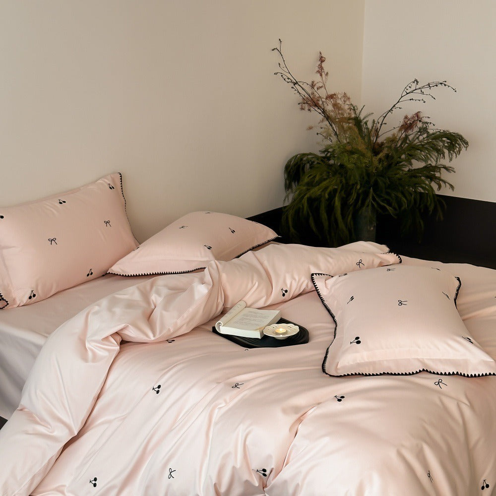 VILZSTUDIOS pastel satin duvet cover set with black cherry and bow embroidery and black zigzag borders