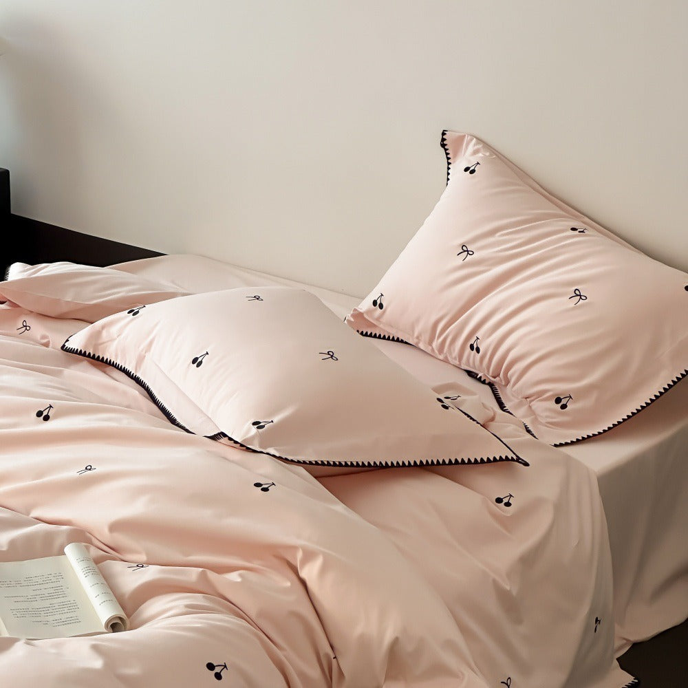 VILZSTUDIOS pastel satin duvet cover set with black cherry and bow embroidery and black zigzag borders