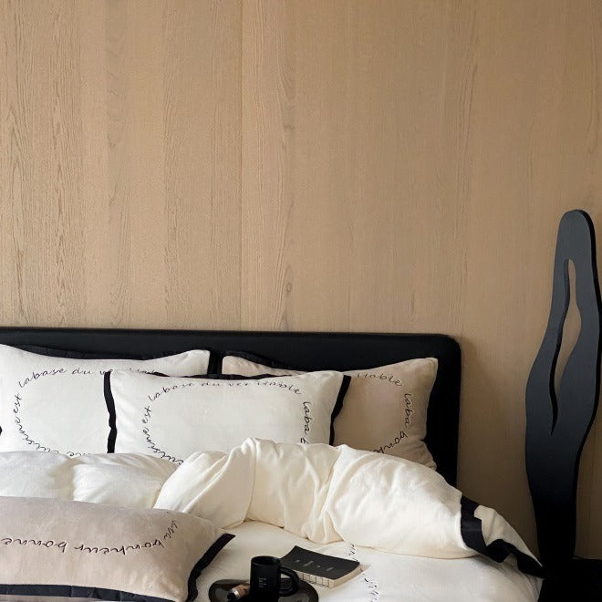 VILZSTUDIOS neutral fleece bedding set with black piping and cursive embroidery