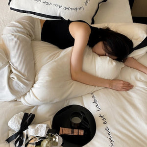 VILZSTUDIOS neutral fleece bedding set with black piping and cursive embroidery