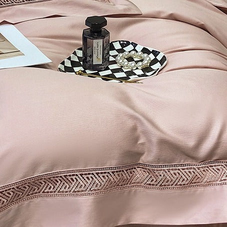VILZSTUDIOS blush pink satin bedding set with geometric cut-out lace borders