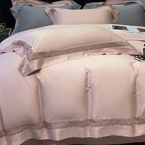 VILZSTUDIOS blush pink satin bedding set with geometric cut-out lace borders