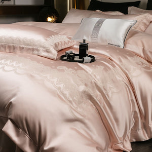 VILZSTUDIOS blush pink satin duvet cover set with champagne scrollwork borders and matching flanged pillowcases