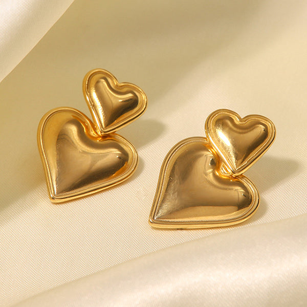 VILZSTUDIOS Heart shaped statement earrings made of zinc alloy