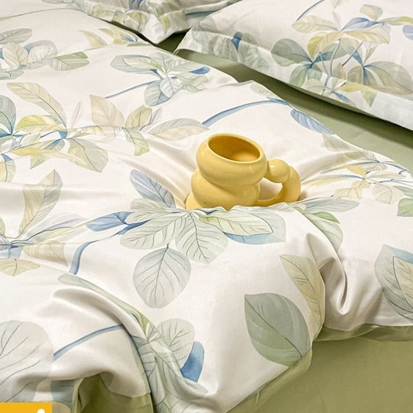 VILZSTUDIOS soft green and blue botanical print satin bedding set with coordinating solid-color reverse