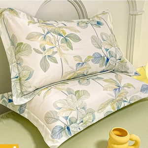 VILZSTUDIOS soft green and blue botanical print satin bedding set with coordinating solid-color reverse