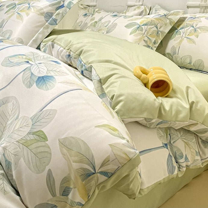 VILZSTUDIOS soft green and blue botanical print satin bedding set with coordinating solid-color reverse