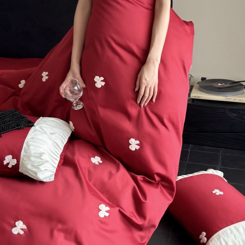 VILZSTUDIOS deep red or blush pink satin duvet cover set with embroidered bows and ivory ruffled pillowcases