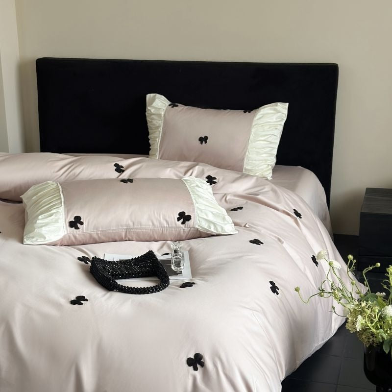 VILZSTUDIOS deep red or blush pink satin duvet cover set with embroidered bows and ivory ruffled pillowcases